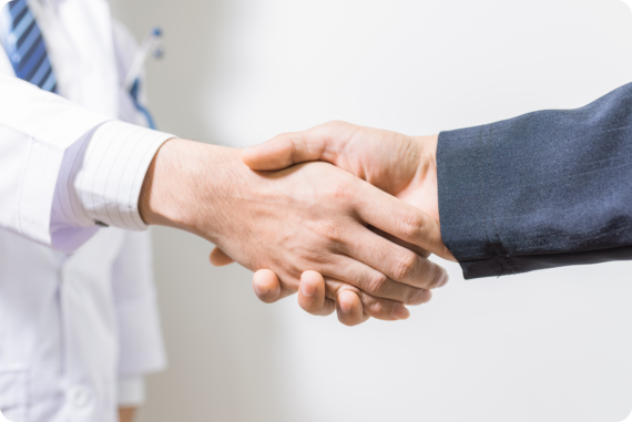 medical director and recruiter or search consultant shake hands